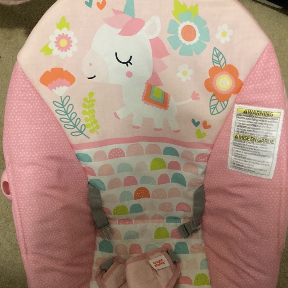Pink vibrating rocking music chair